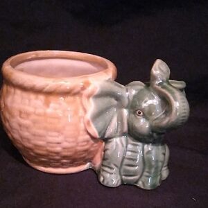 VIintage Majolica style Green Elephant wth Basket Ceramic Planter